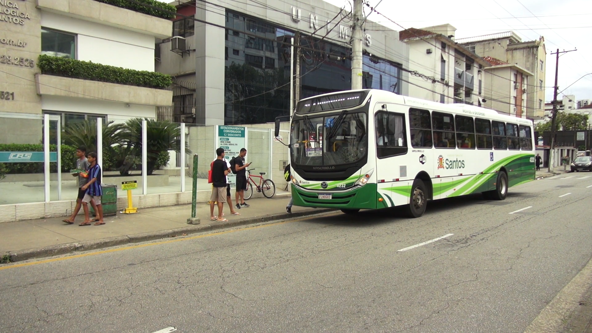 People Boarding a Bus